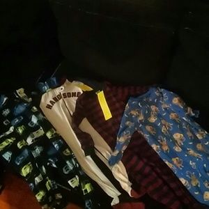 NWT. Baby boys Set of 4 footed sleepers.